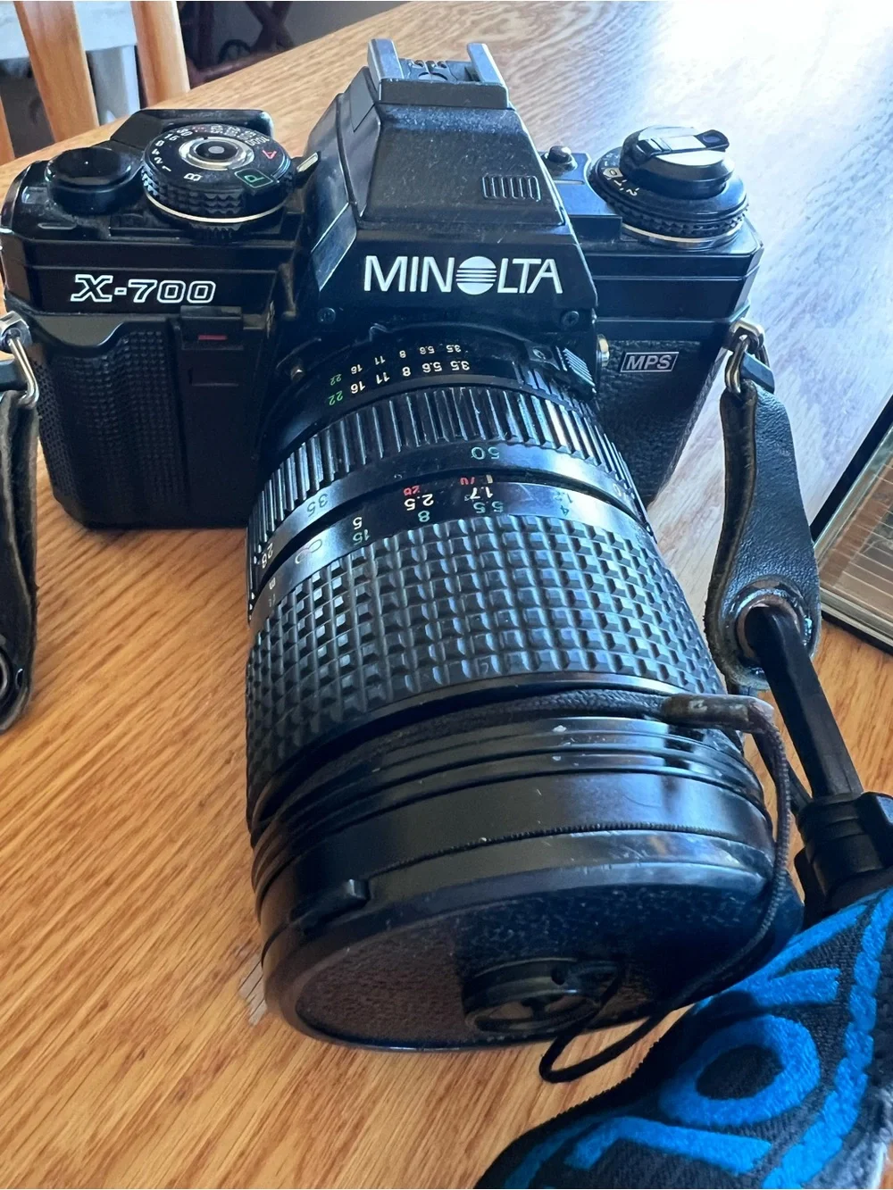Minolta X-700 Film Camera with Black/Blue Strap, lens, adapter, auto thyristor